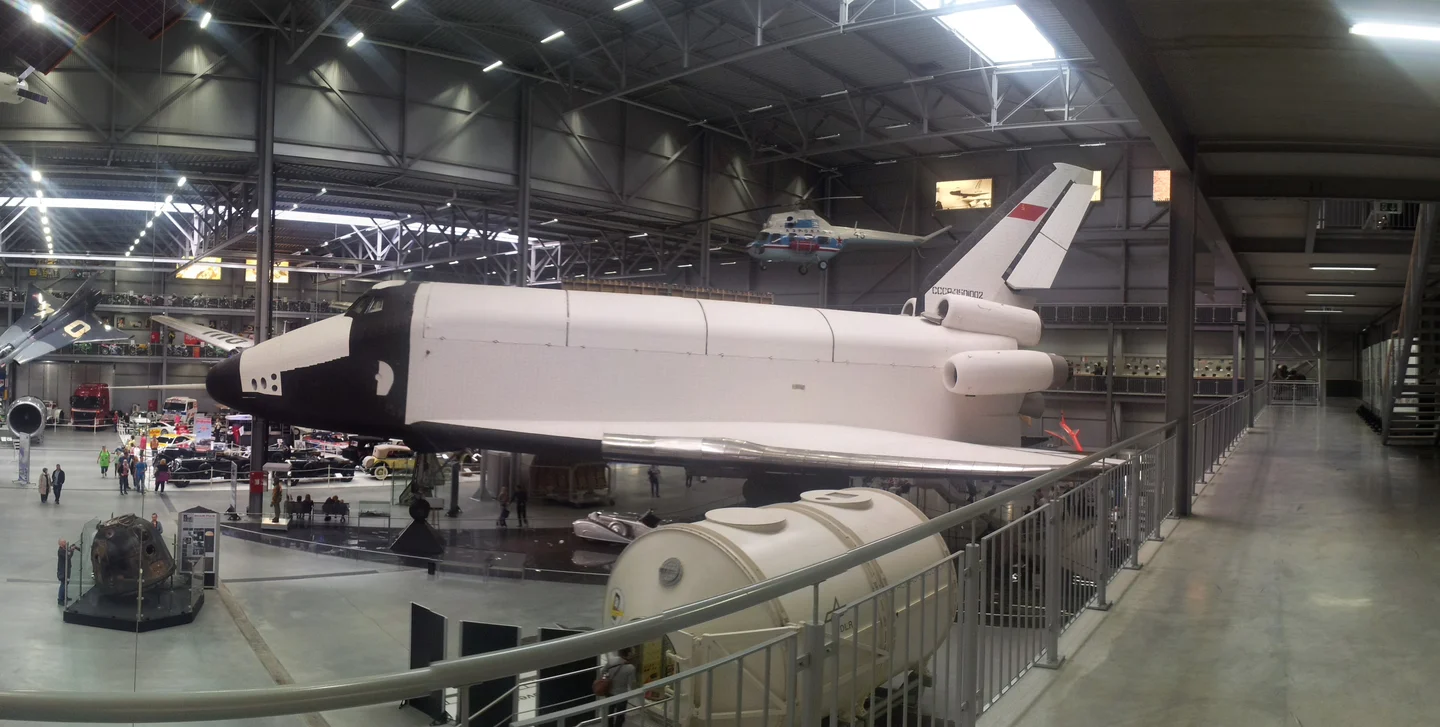 The white OK-GLI atmospheric test analogue at Technik Museum Speyer, with its wing, landing gear and rear jet-engine nacelles visible.