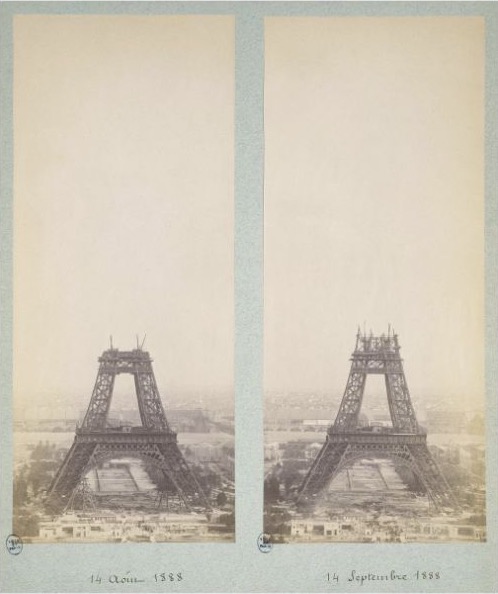 Two album photographs show the tower partly built, each with a handwritten date below it.