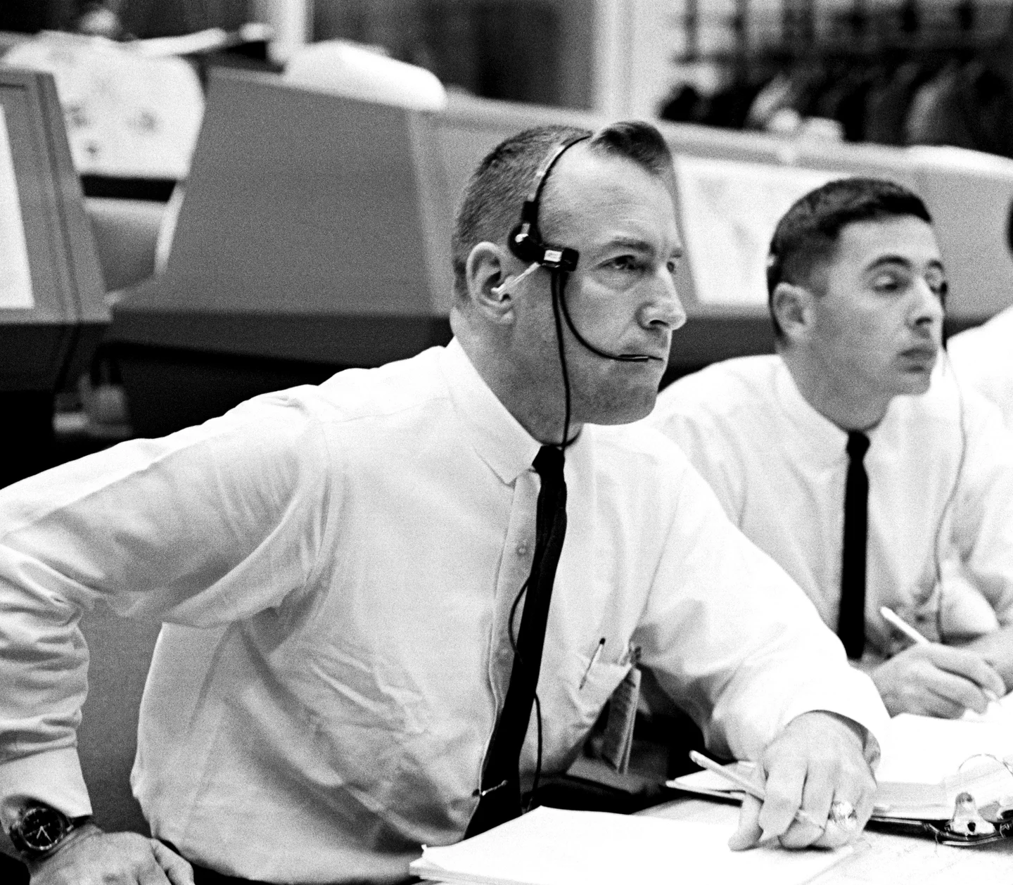Jim Lovell and Bill Anders at Mission Control consoles during the Gemini 8 mission.