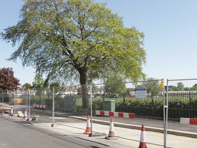 Roadworks and fencing at a power cable joint bay.